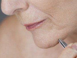 Plucking eyebrows and your chin...magnification shows you all that hair!