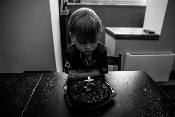 Canva - Boy Looking at Birthday Cake