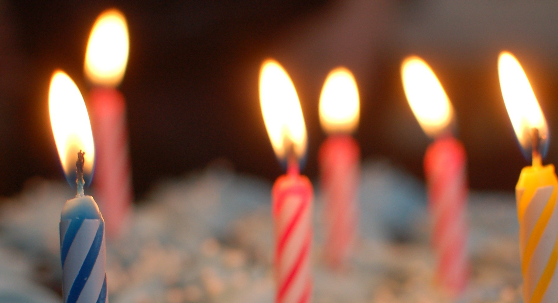 Canva - Lighted Candles on Cupcakes